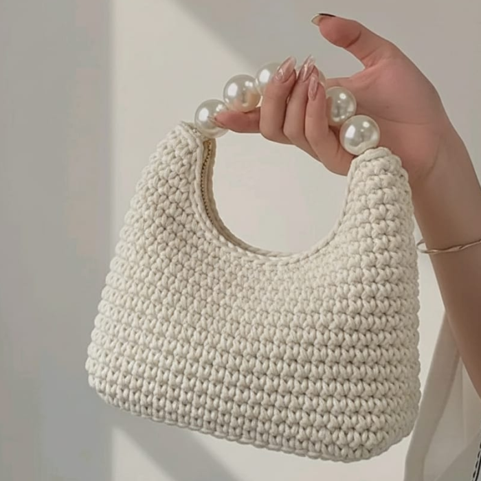 The Crescent Pearl Clutch